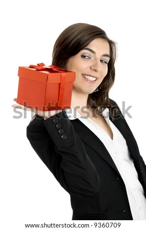 Beautiful business woman holding a gift isolated on white