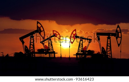 Collage. Oil field at sunset. Royalty-Free Stock Photo #93616423