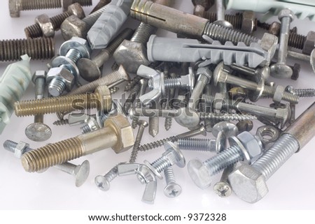 Screws and nuts isolated on white background