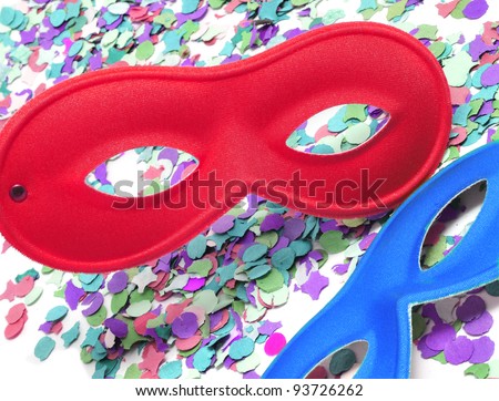 carnival masks and confetti of different colors