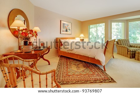 Beautiful bedroom with golden tones.