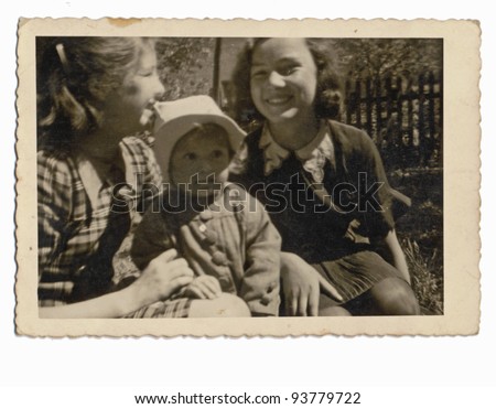 PRAGUE , CZECH REPUBLIC , CIRCA 1940 - An unidentified three kids, girls