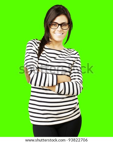 portrait of a young happy woman posing against a removable chroma key background