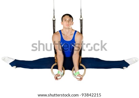 The sportsman the guy, carries out difficult exercise, sports gymnastics, on white background, isolated