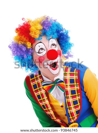 Clown looking to the copy space area  in a white studio Royalty-Free Stock Photo #93846745