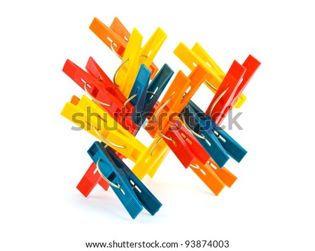 Abstract construction made of clothespins isolated on white background