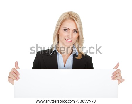 Cheerful businesswomen presenting empty board. Isolated on white