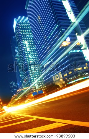 light trails on the modern city street at night