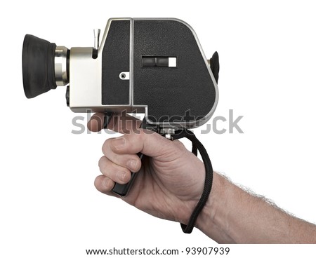 Hand holding a camera super 8 isolated on white