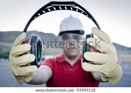 ear muff to protect workers' ears Royalty-Free Stock Photo #93909118