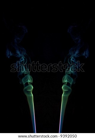 abstract picture of coloured smoke on the black background