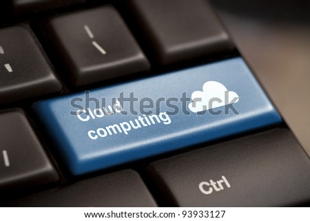 Cloud computing concept showing cloud icon on computer key.