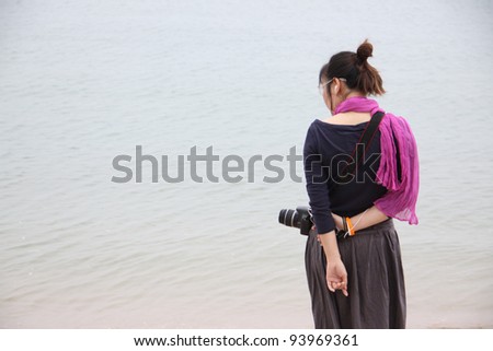 San woman on beach