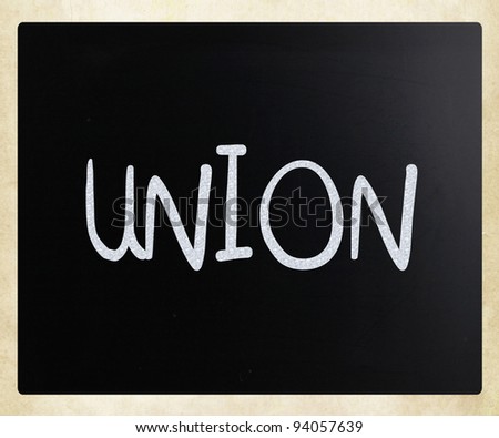 The word "Union" handwritten with white chalk on a blackboard
