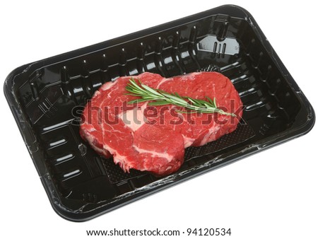 Ribeye beef steak in plastic packaging tray