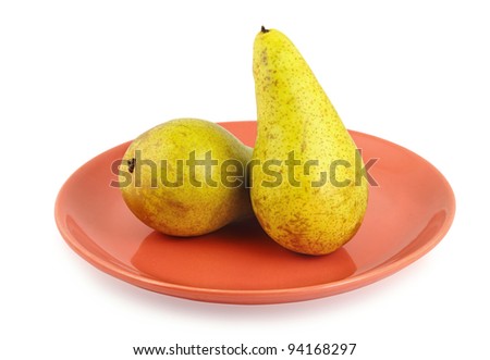 Two juicy pears lie on a plate. Image is isolated on white and the file includes a clipping path.