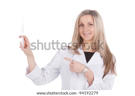Woman doctor brings syringe and shows to it