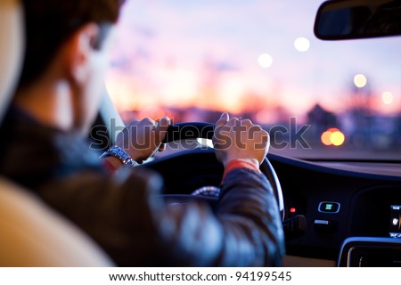 Driving a car at night Royalty-Free Stock Photo #94199545