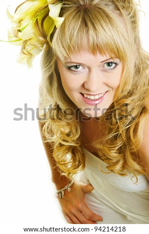 beautiful woman with lily flower in hair