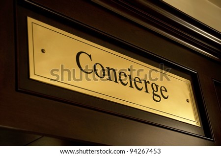 Golden concierge sign in a luxury hotel
