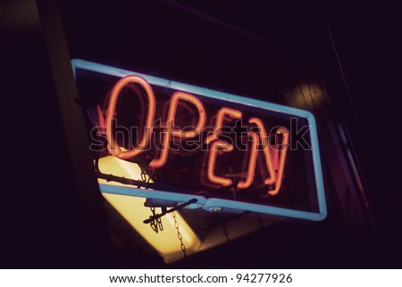 Open sign with red neon and blue frame
