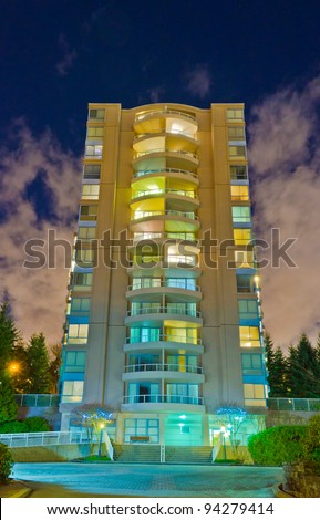 Fantastic view of modern city luxury building at night in Vancouver, Canada.