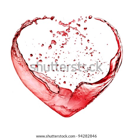 Valentine heart from red wine isolated on white background