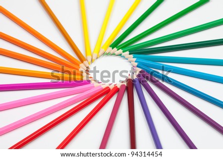 set of color pencils in shape of sun