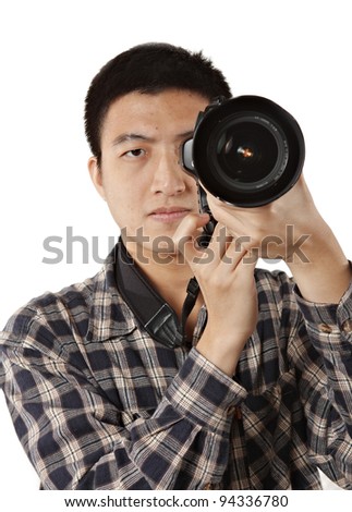 Male photographer holding camera