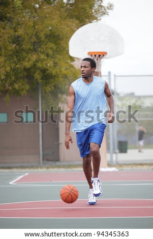 Basketball player running with the ball