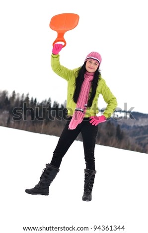 young woman sledding