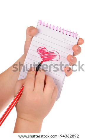 heart painted in the notebook. isolated