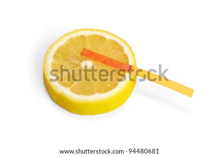 Lemon acid reaction - litmus paper red Royalty-Free Stock Photo #94480681
