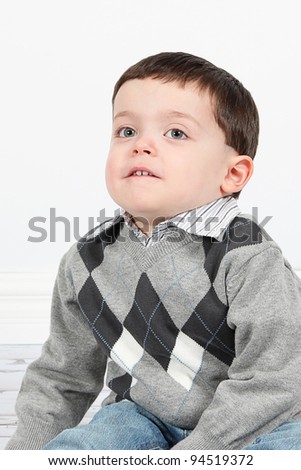 Cute little boy posing for camera