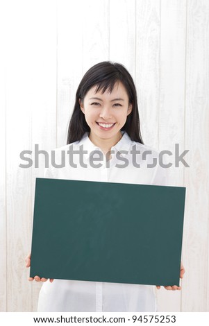 Pretty Girl Holding Chalkboard