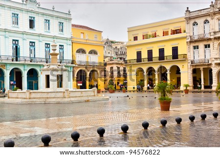 Raining in La Plaza Vieja, a touristic landmark in Old Havana