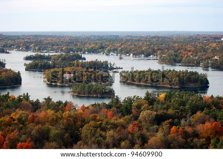 Thousand Islands aerial view in fall, from Sky deck on Hill Island, on the border of Canada and USA Royalty-Free Stock Photo #94609900
