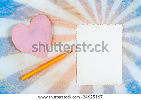 Valentine's Day sunburst retro background with framed card and pencil