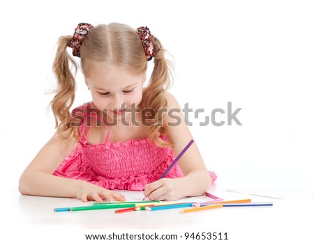 happy girl drawing with pencils