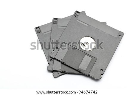 Floppy disk magnetic computer data storage support over white background