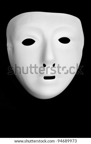 white mask on a black background
