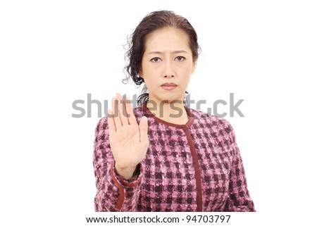 Asian businesswoman making stop sign