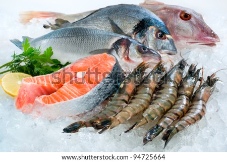 Seafood on ice at the fish market Royalty-Free Stock Photo #94725664