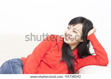young woman relaxing on a sofa
