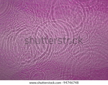 Abstract fresh water ripple on pink background