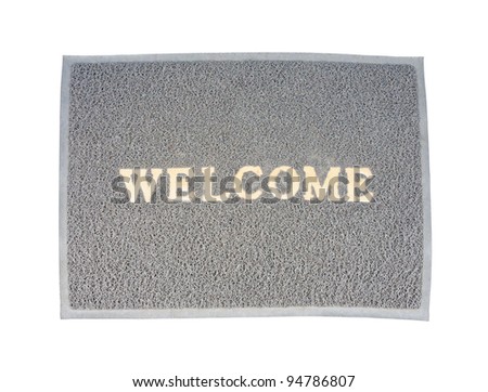 Old welcome doormat on the white background.