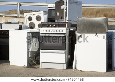 Kitchen Appliance Garbage on a sunny day Royalty-Free Stock Photo #94804468