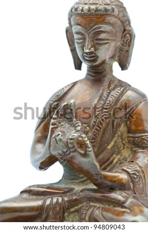 Statue of Buddha in bronze on a white background