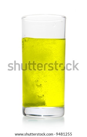 Vitamin pill dissolve in glass of water isolated over white background