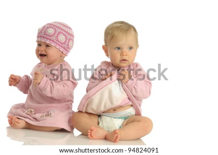 Picture of two little girls wearing same dress